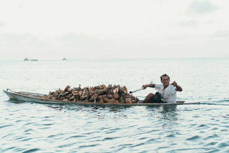 local conch fisherman in Caye Caulker Belize