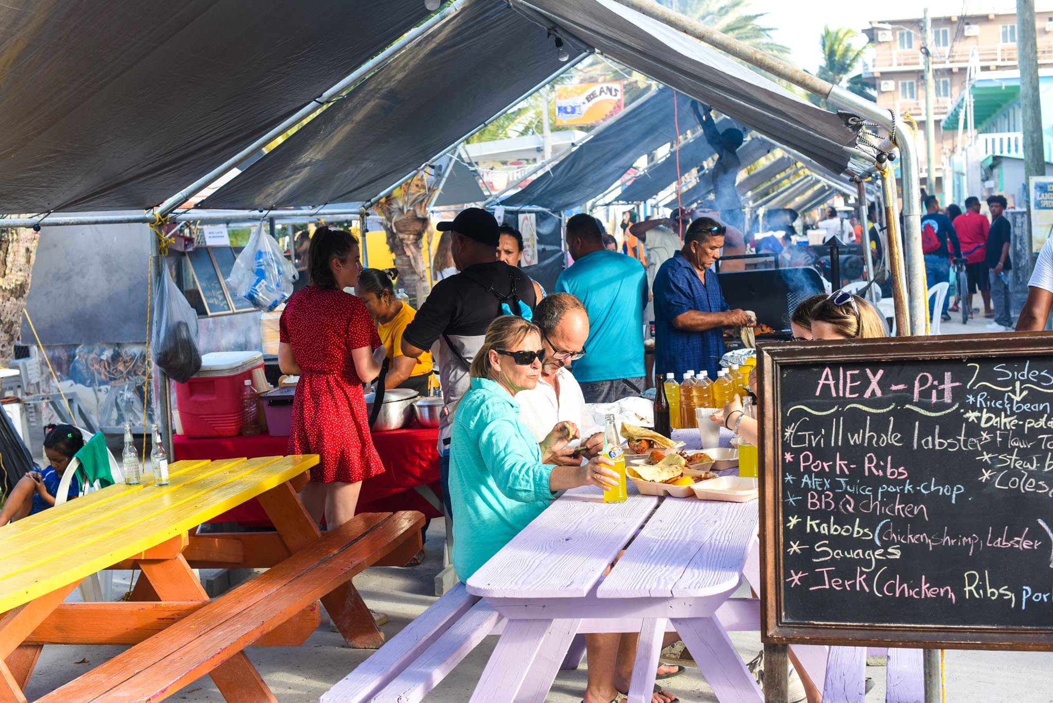 tourists and locals enjoying Belize Lobster Festivals